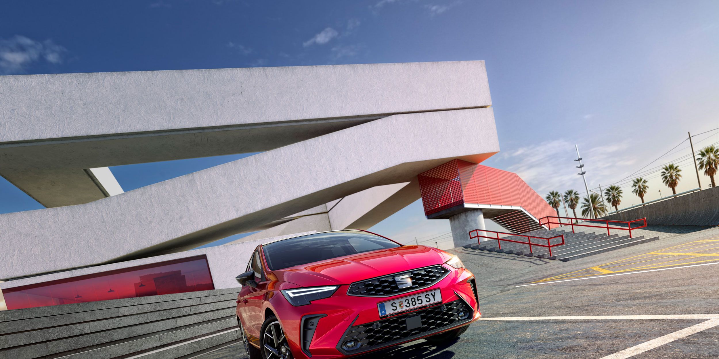 Vista lateral do novo SEAT Ibiza na versão FR, estacionado ao ar livre.