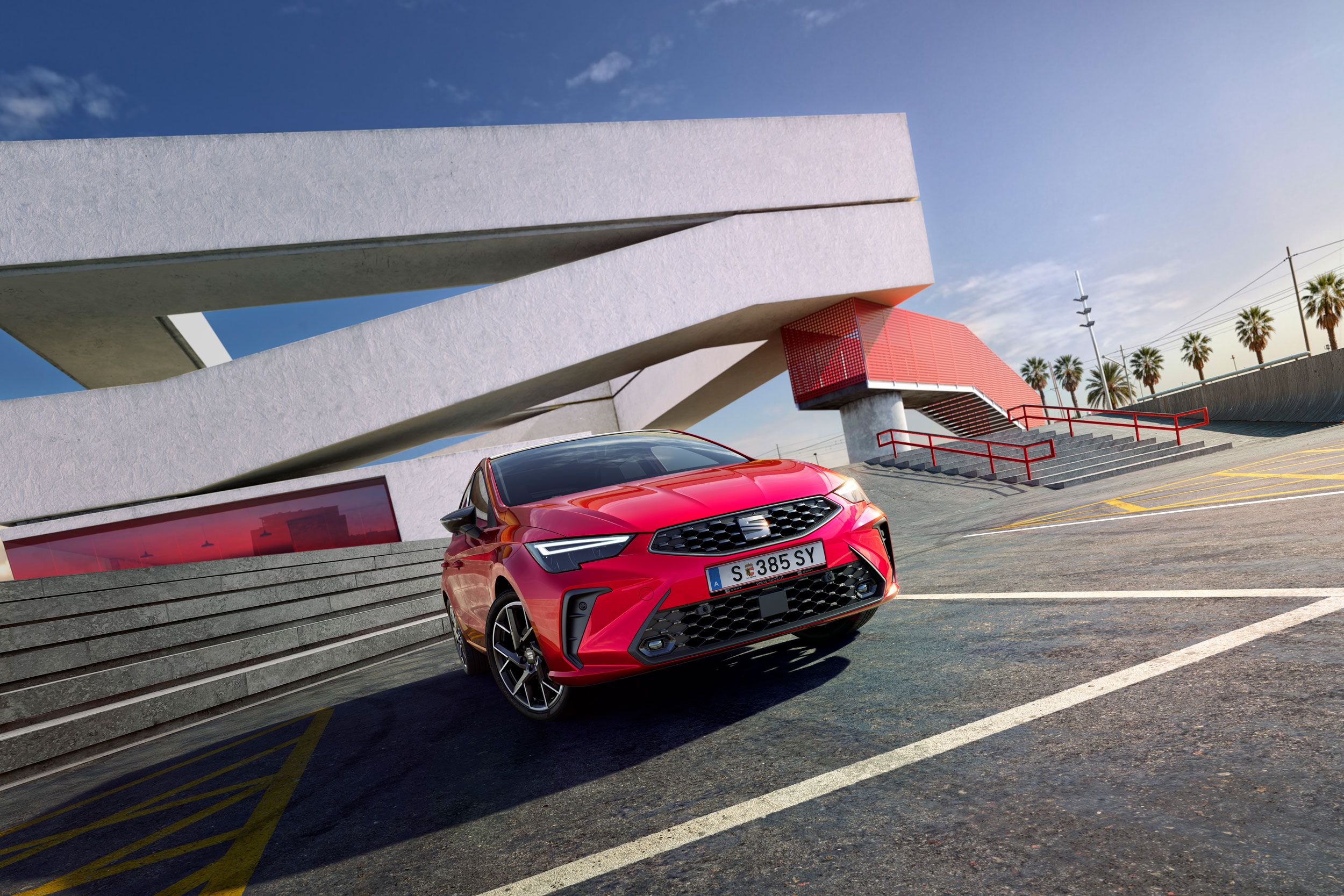 Vista lateral do novo SEAT Ibiza na versão FR, estacionado ao ar livre.