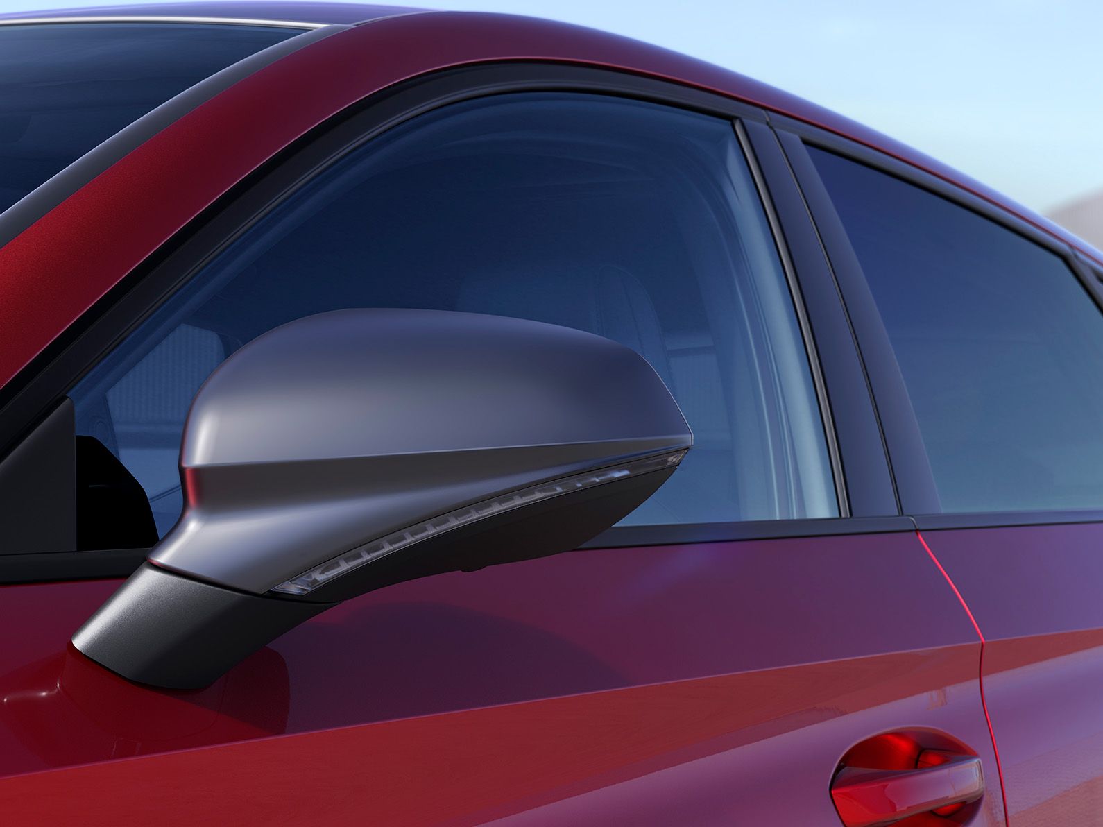 SEAT Leon vermelho Desire com espelhos em cinzento Cosmo
