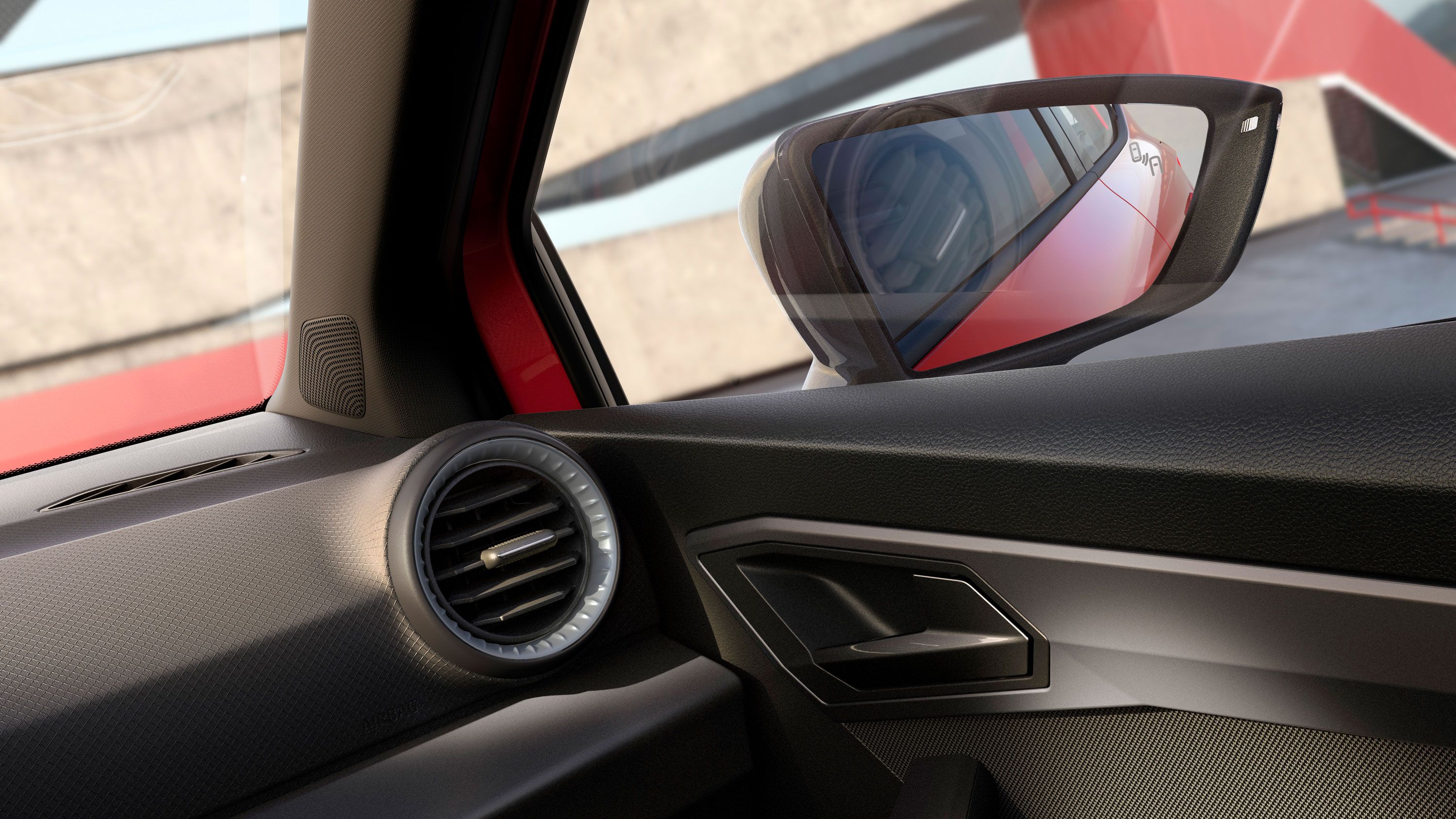 Vista parcial do interior, destacando alguns detalhes e o retrovisor lateral direito.