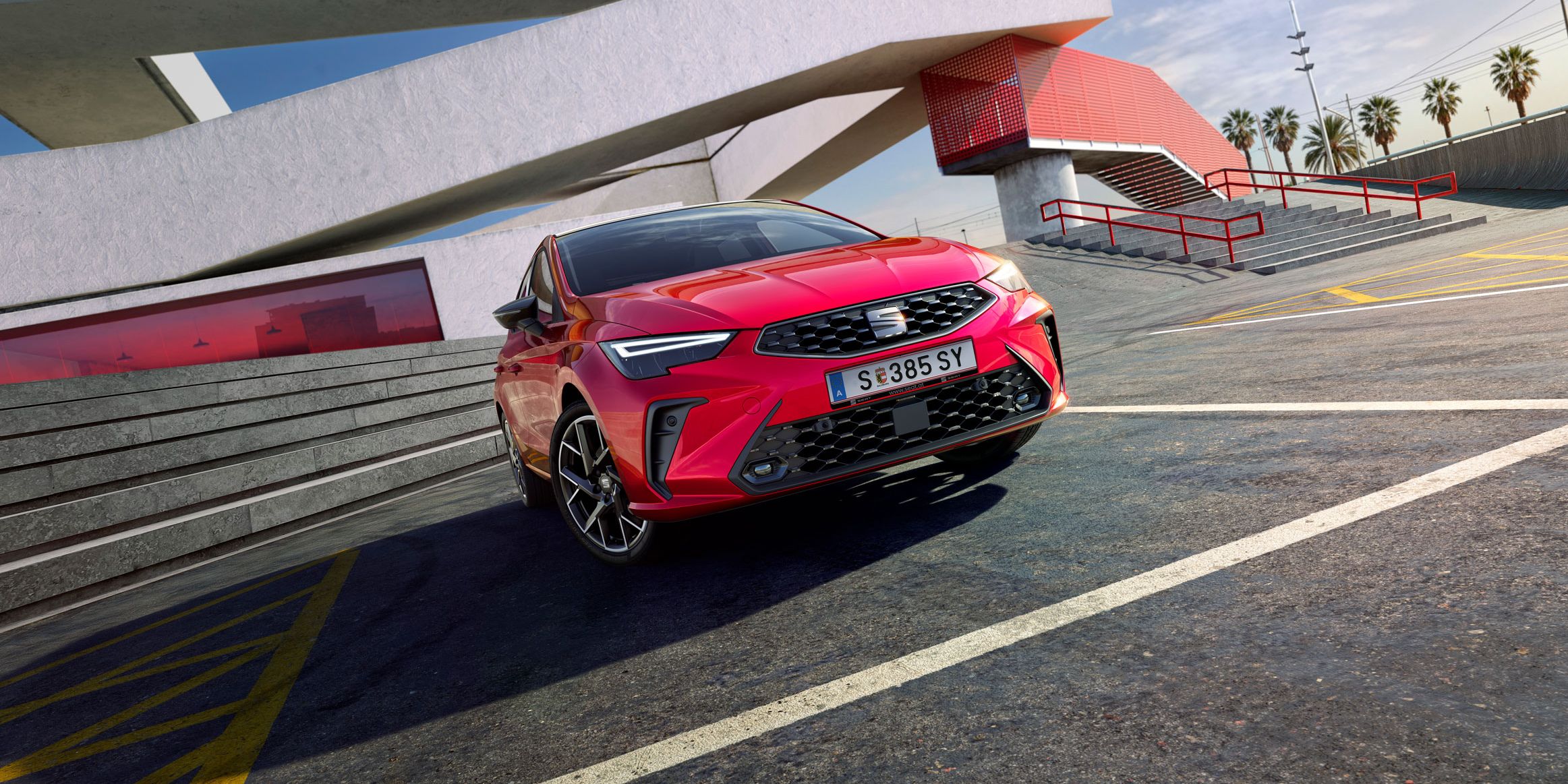 Vista lateral do novo SEAT Ibiza na versão FR, estacionado ao ar livre.
