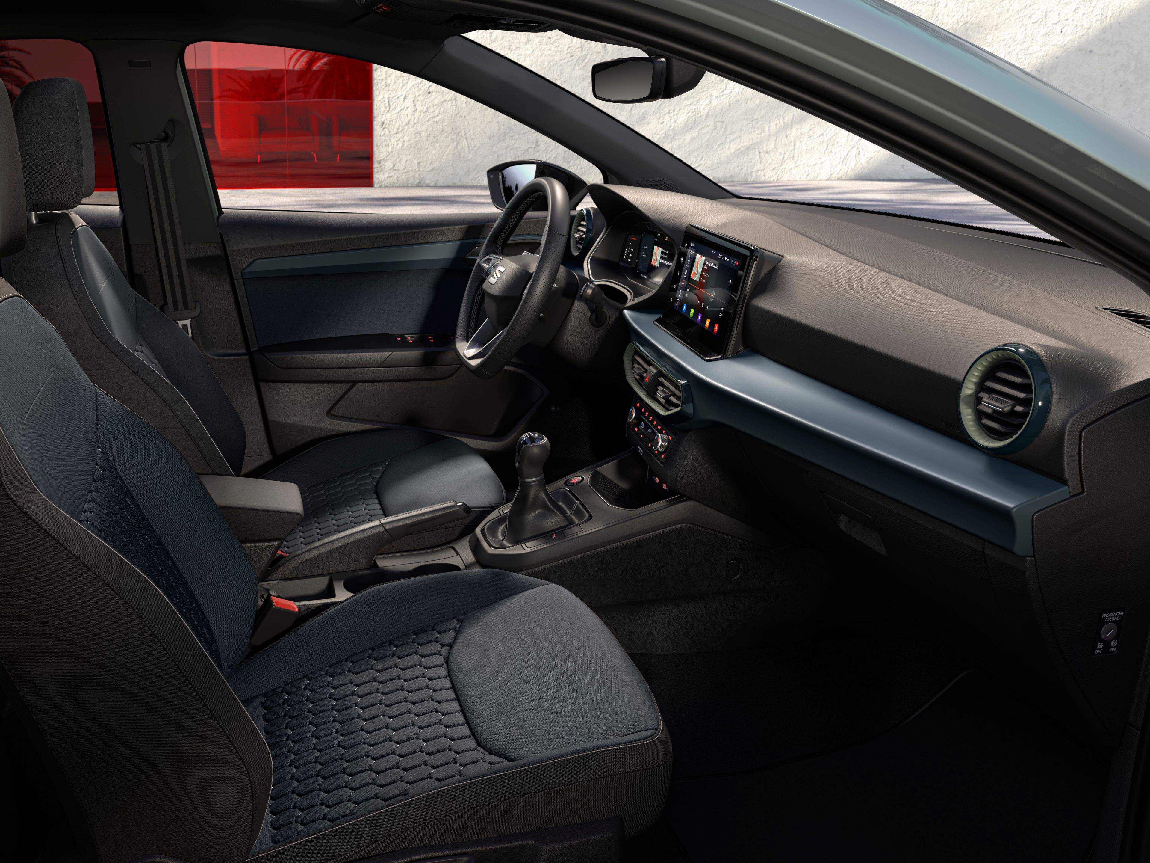 Detalhes do interior do SEAT Ibiza, incluindo os bancos standard gravados em Aurora da versão Style.