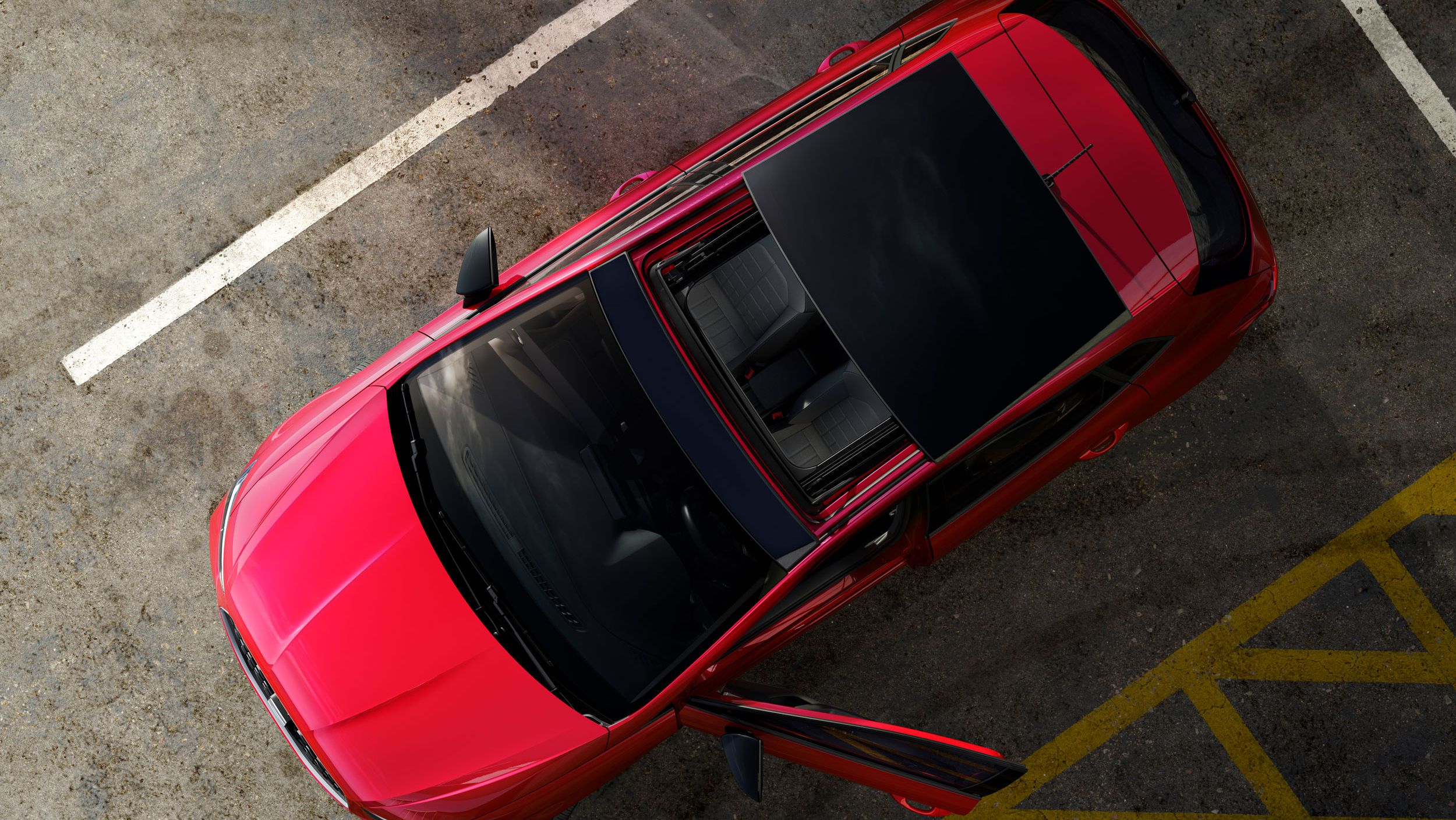 Vista superior do SEAT Ibiza com o teto de abrir aberto.