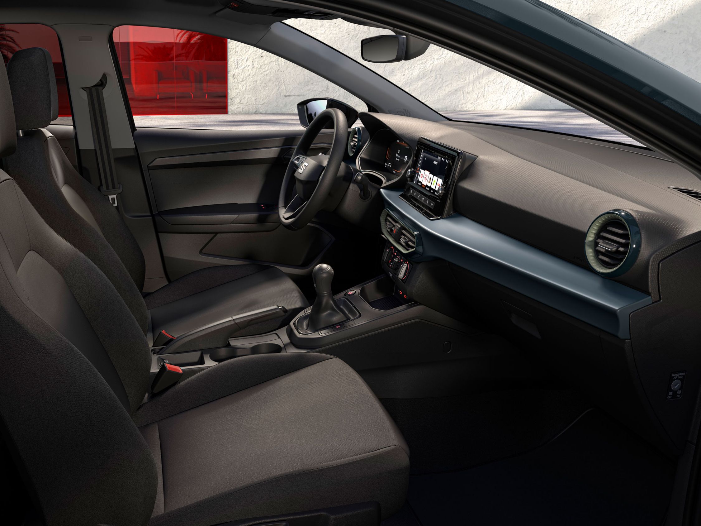 Detalhes do interior do SEAT Ibiza, incluindo os bancos de tecido Comfort em cor Acero.